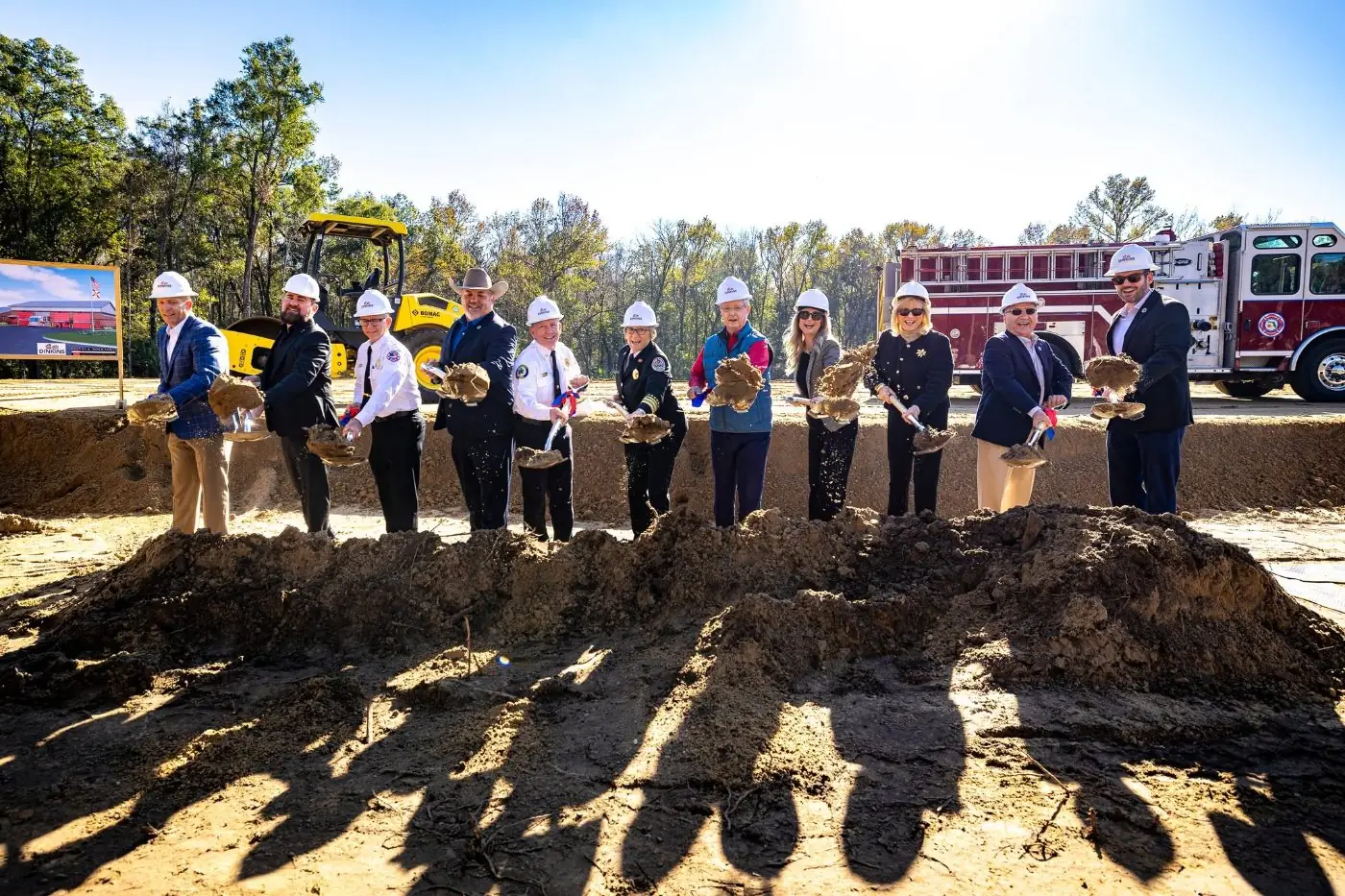 Community groundbreaking with local leaders and fire department